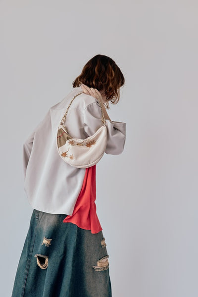 Asymmetrical shirt jacket with flared cuffs